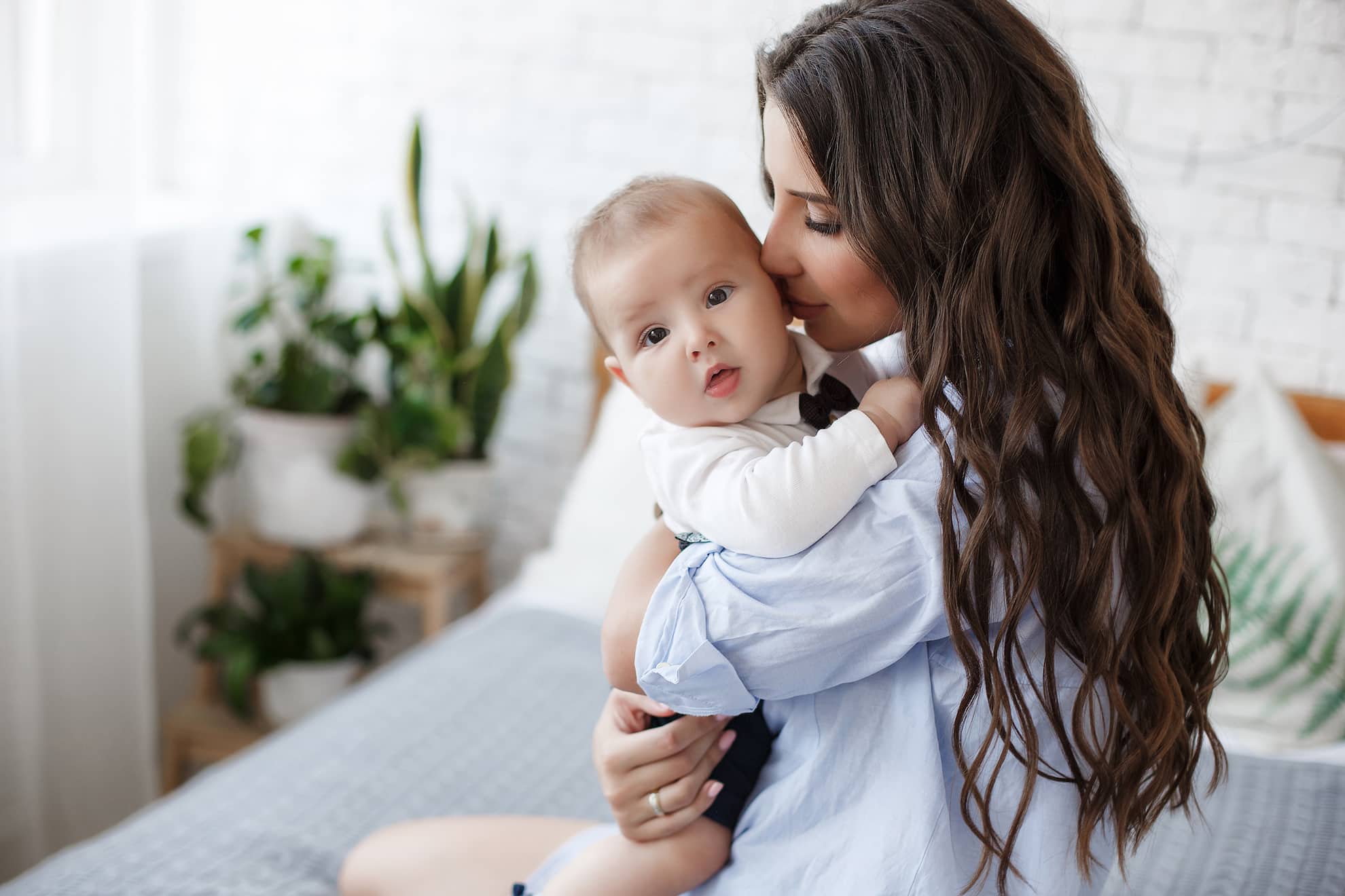 mother holding daughter